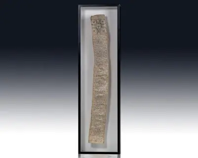 Framed ancient manuscript