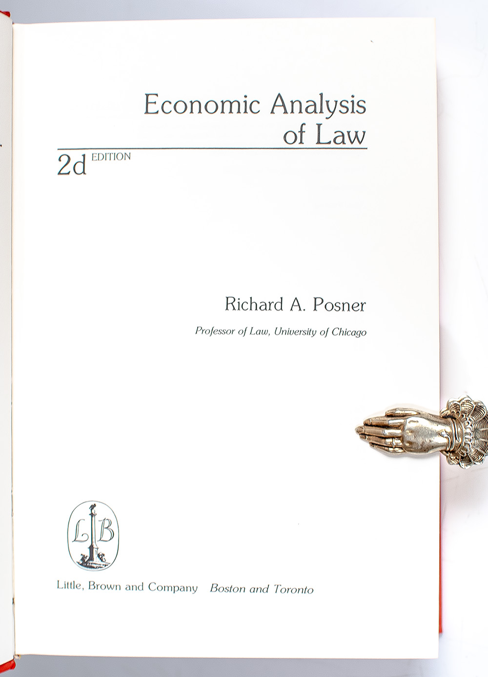 Economic Analysis of Law.