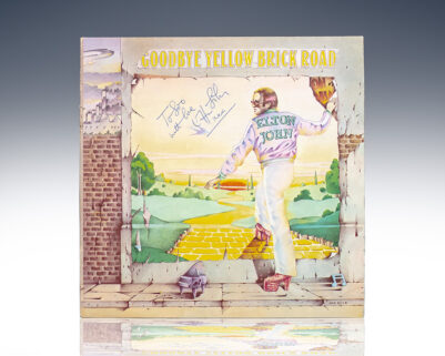 Elton John Signed Goodbye Yellow Brick Road.
