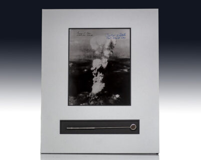 Inspection Mirror That Built the Atomic Bomb Used By Oppenheimer's Foreman Gus Schultz. [with] Paul Tibbets and George Caron Signed Photograph.