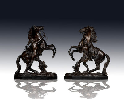 Pair of French Bronze Models of Marly Horses.