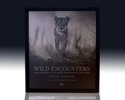 Wild Encounters: Iconic Photographs of the World's Vanishing Animals and Cultures.