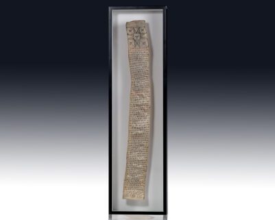 Framed ancient manuscript