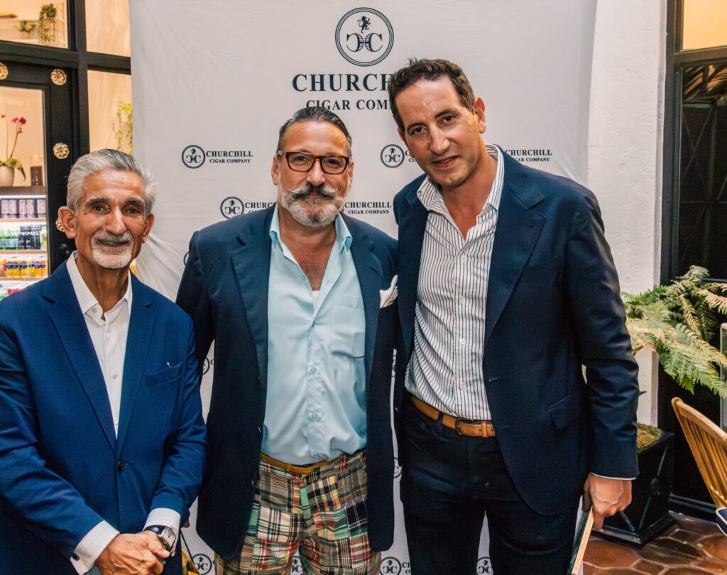 Ted Leonisis, Chip Kidd, and Matthew Raptis at Churchill Cigar Company in Palm Beach