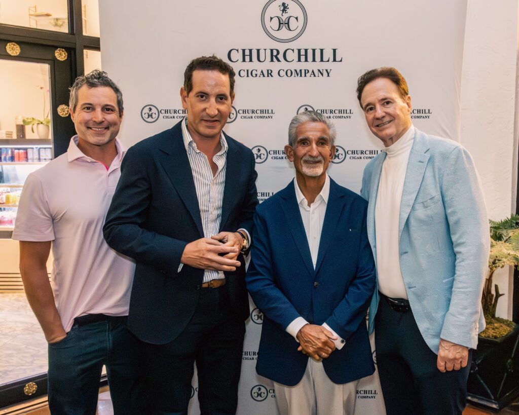 Matthew Raptis, Ted Leonsis, and Steve Pagliuca at Churchill Cigar Company on Worth Avenue in Palm Beach